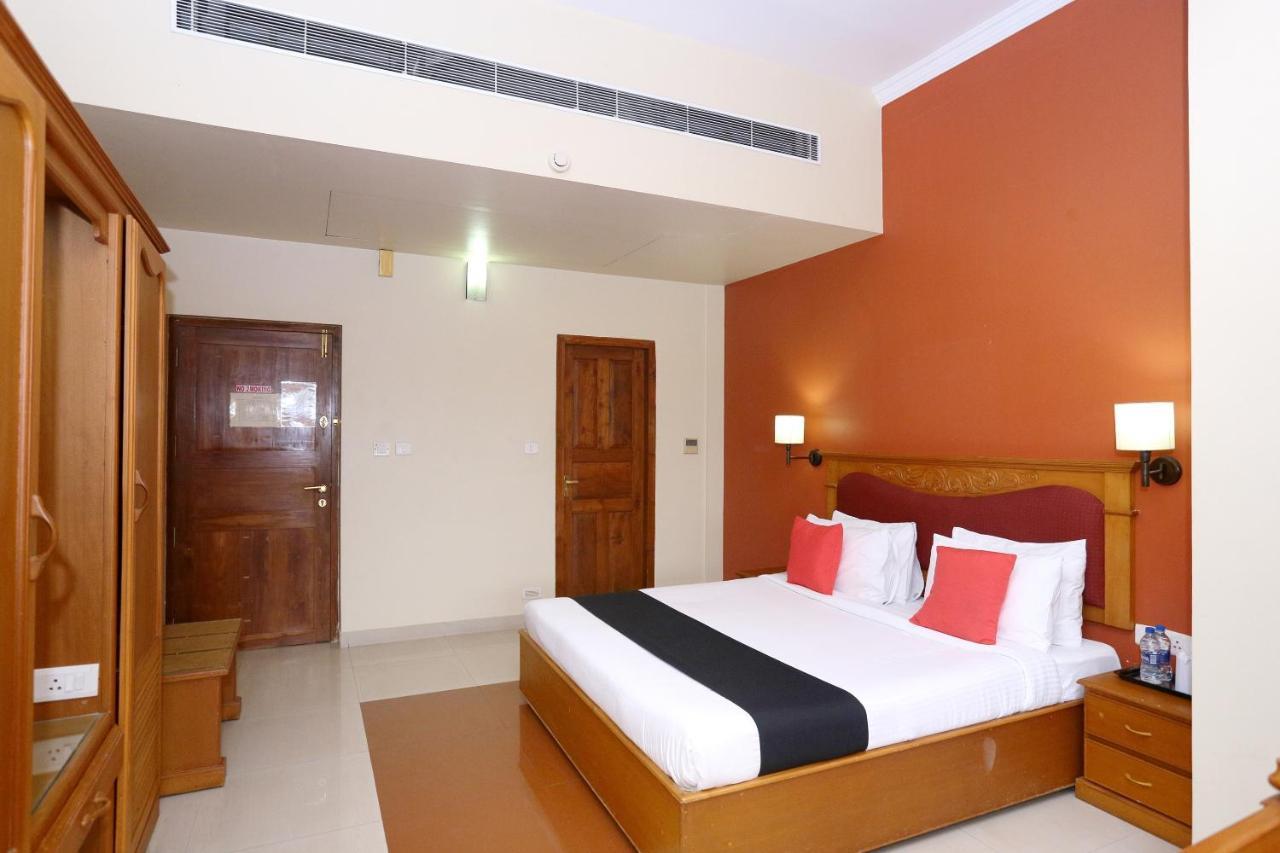 Capital O 45944 Club 7 Hotel Tiruvalla Esterno foto